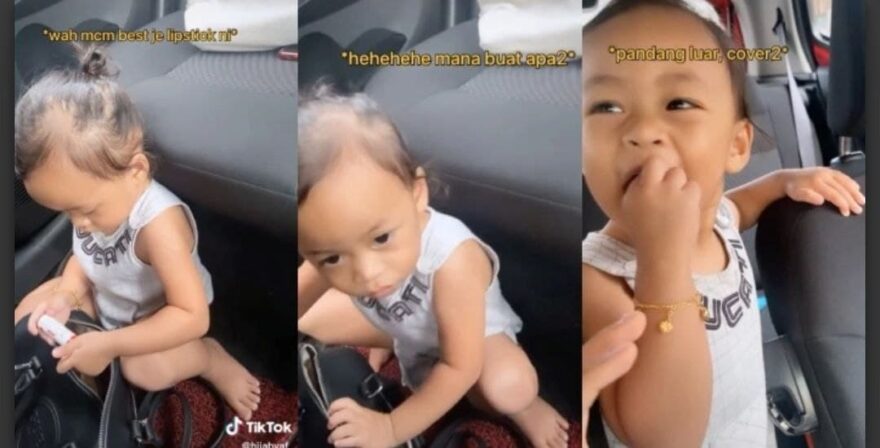 Budak terkantoi punggah handbag,”Nak cover konon, ingat tak nampak ke”