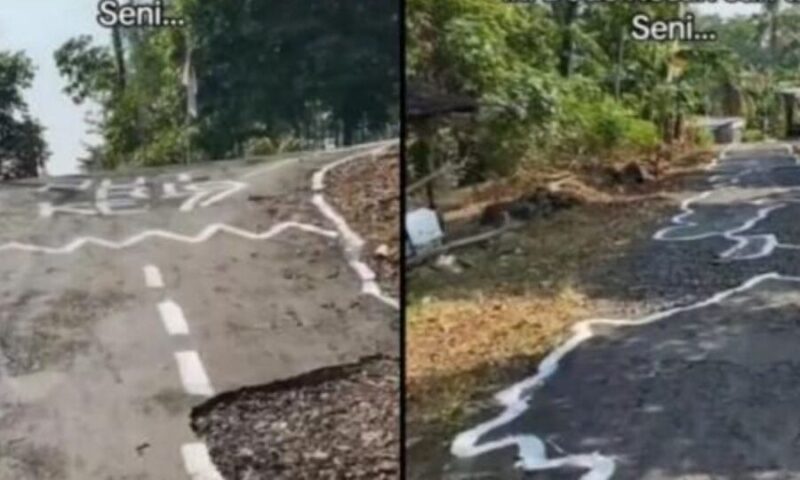 Jalan tak dibaiki, pemuda lukis seni abstrak pada permukaan jalan rosak teruk